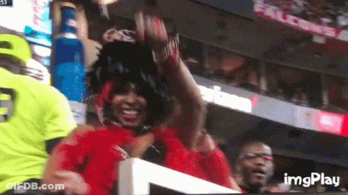 Woman In Red Dress Watching Game With Imgplay GIF