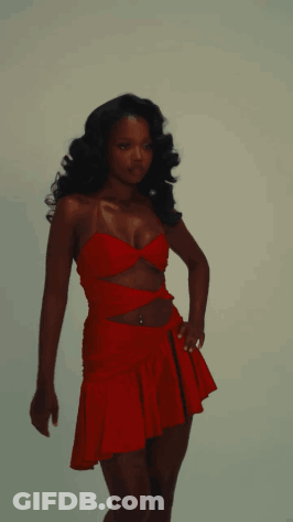 Woman In Red Dress With Belly Button Piercing GIF