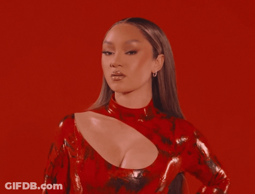 Woman In Red Dress With Front Cutout GIF