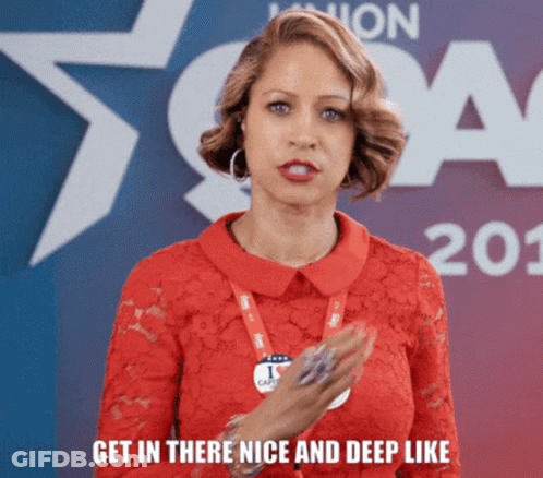 Woman In Red Dress With I Care Lanyard GIF