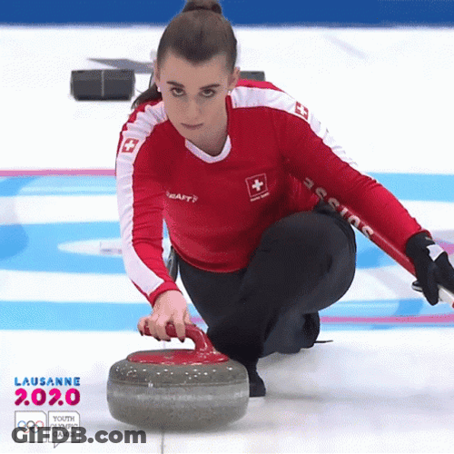 Woman In Red Focused Curling GIF