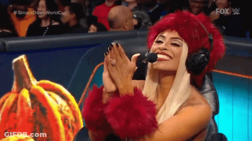 Woman In Red Fur Hat Clapping GIF