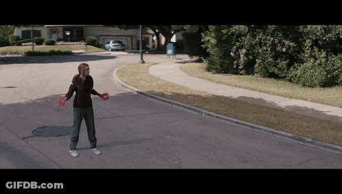 Woman In Red Gloves On Street GIF