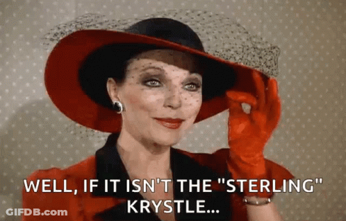 Woman In Red Hat And Gloves Saying Well GIF