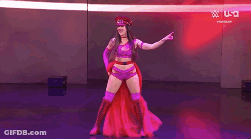 Woman In Red Hat And Purple Outfit Pointing GIF