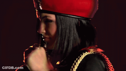 Woman In Red Hat Fist Pump GIF