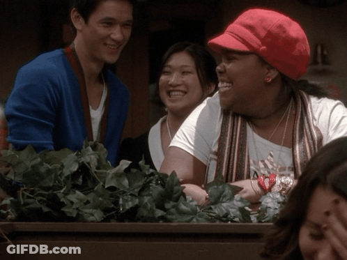 Woman In Red Hat Laughing With Man And Woman GIF