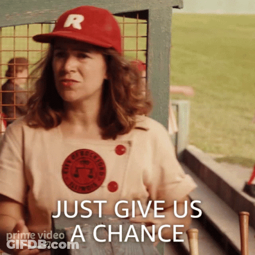 Woman In Red Hat Saying Just Give Us A Chance GIF