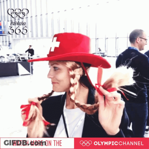 Woman In Red Hat With Cross GIF