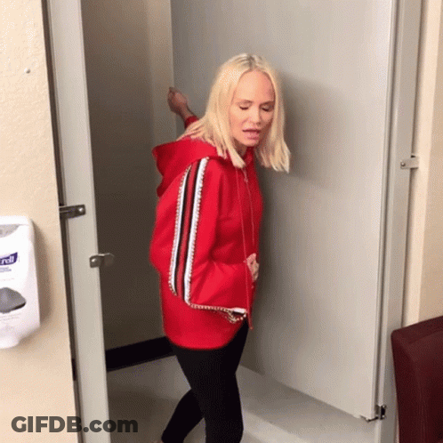 Woman In Red Hoodie At Kleenex Hand Sanitizer GIF