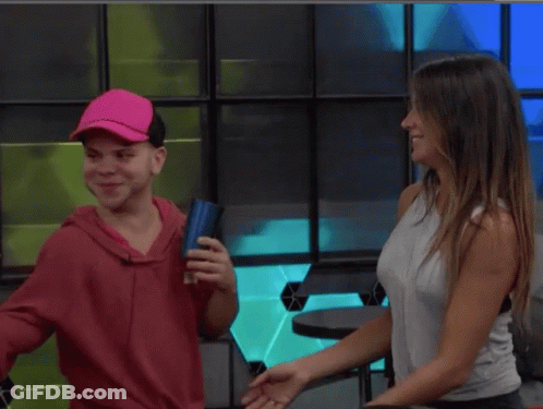 Woman In Red Hoodie Hugging Woman In White Tank Top GIF