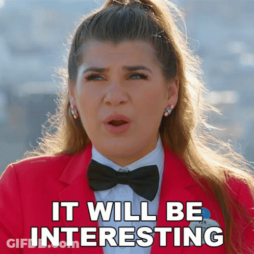 Woman In Red Jacket And Black Bow Tie Says Interesting GIF