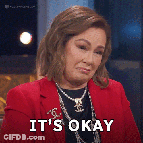 Woman In Red Jacket And Pearls Says Okay GIF