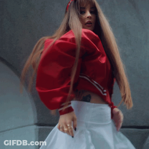 Woman In Red Jacket And White Skirt GIF