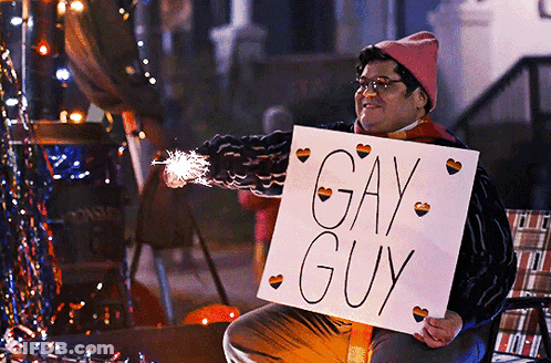 Woman In Red Jacket Holding Gun In Front Of Clock At 3:40 GIF