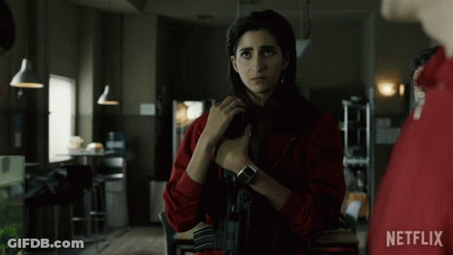 Woman In Red Jacket Holding Gun GIF