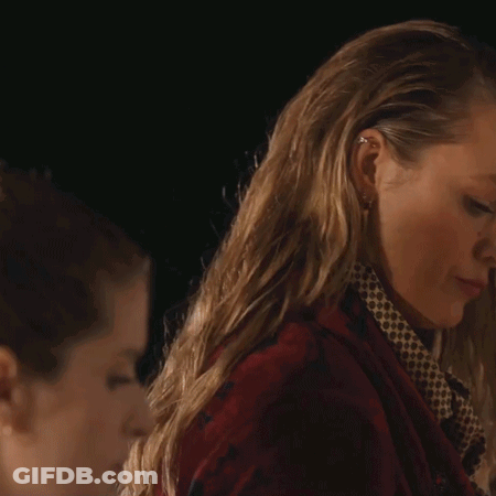Woman In Red Jacket Holding Martini Glass GIF