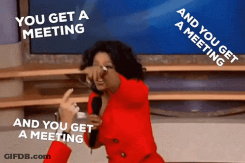 Woman In Red Jacket Holding Microphone Saying You Get A Meeting GIF