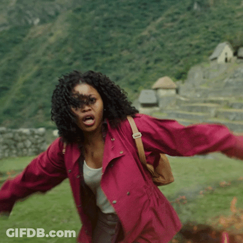 Woman In Red Jacket In Field GIF