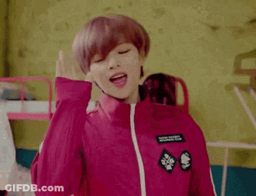Woman In Red Jacket Making Funny Face With Helmet GIF