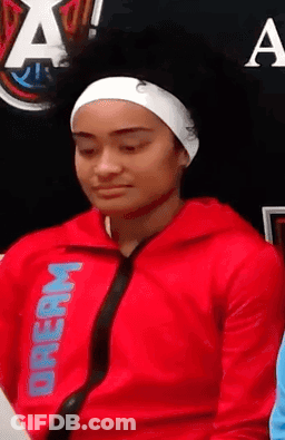 Woman In Red Jacket Saying Dream GIF