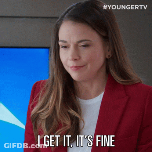 Woman In Red Jacket Saying It's Fine GIF