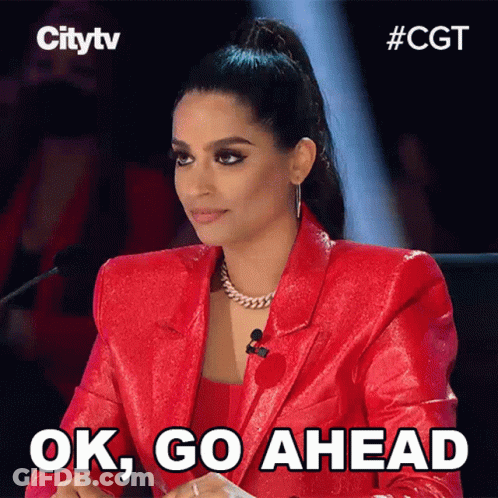 Woman In Red Jacket Saying Ok Go Ahead GIF