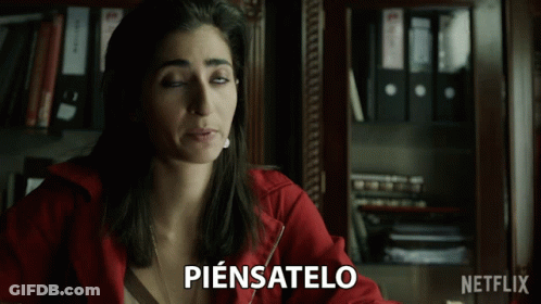 Woman In Red Jacket Saying Piensatelo GIF