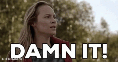 Woman In Red Jacket Says Damn It In Front Of Trees GIF