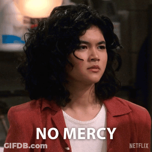 Woman In Red Jacket Says No Mercy GIF