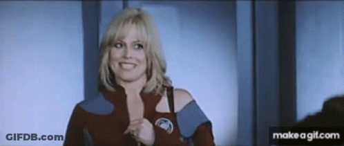 Woman In Red Jacket Smiling GIF