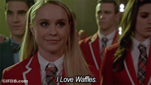 Woman In Red Jacket Smiling Says I Love Waffles GIF