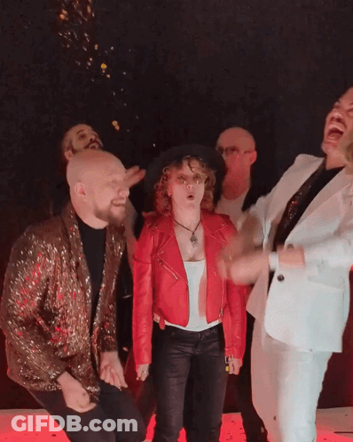 Woman In Red Jacket Standing GIF