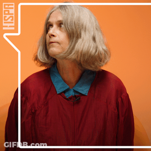 Woman In Red Jacket With Hispan Speech Bubble GIF