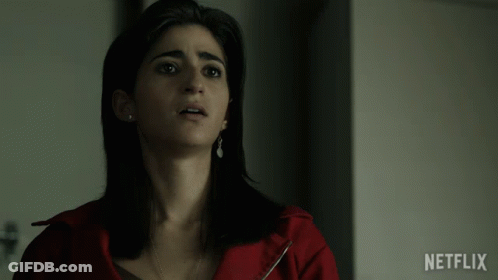 Woman In Red Jacket With Netflix GIF