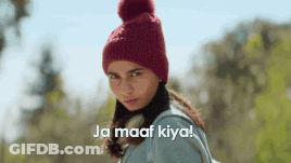 Woman In Red Knitted Hat And Backpack Says Ja Maaf Kiya GIF