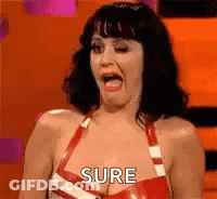 Woman In Red Latex Dress Making Funny Face GIF