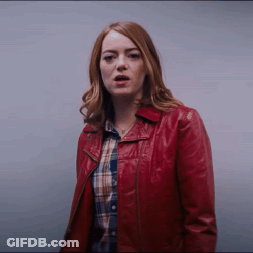 Woman In Red Leather Jacket And Plaid Shirt GIF