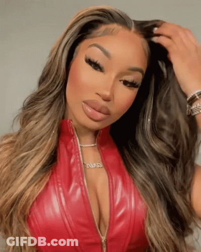 Woman In Red Leather Top With Silvia Necklace GIF