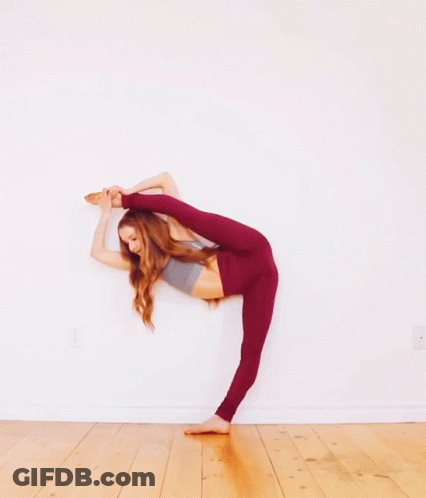Woman In Red Leggings Doing Split GIF