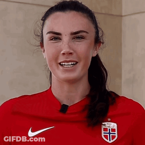 Woman In Red Nike Shirt Saying Norge GIF