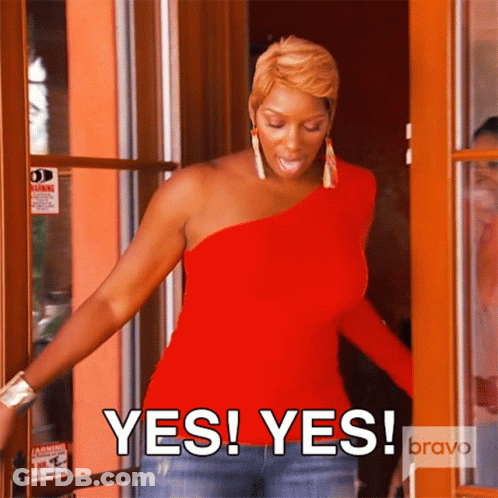 Woman In Red One Shoulder Top Saying Yes GIF