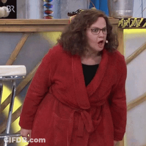 Woman In Red Robe And Glasses In Party Zone GIF
