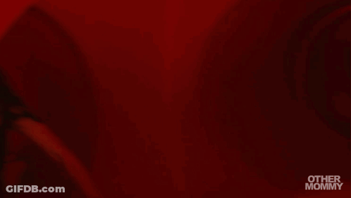 Woman In Red Room Saying Other Mommy GIF