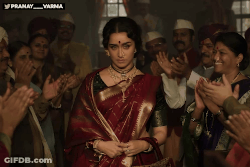 Woman In Red Saree Standing Before Crowd With Pranay_varma GIF