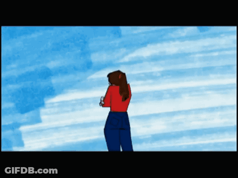 Woman In Red Shirt And Blue Jeans In Front Of Blue Background GIF