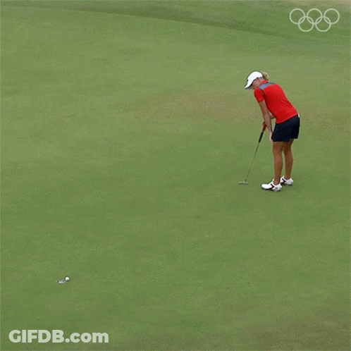 Woman In Red Shirt And White Hat Putting Golf Ball GIF