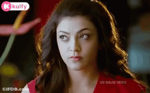 Woman In Red Shirt Close Up GIF