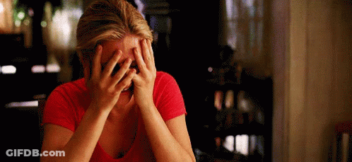 Woman In Red Shirt Covering Face GIF