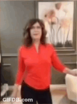 Woman In Red Shirt Dancing GIF